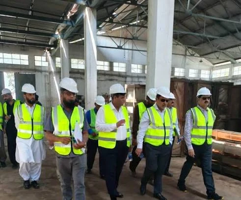 NGC Managing Director and colleagues inspecting warehouse work during the Gatti Grid Station visit